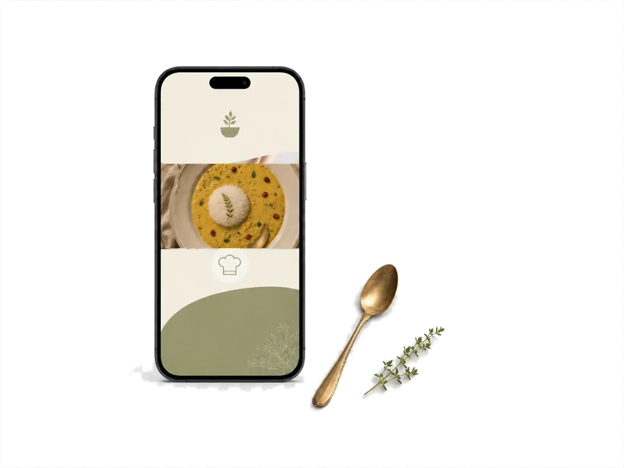 Celular exibindo a oficina de culinária, ao lado de uma tigela e uma pera.